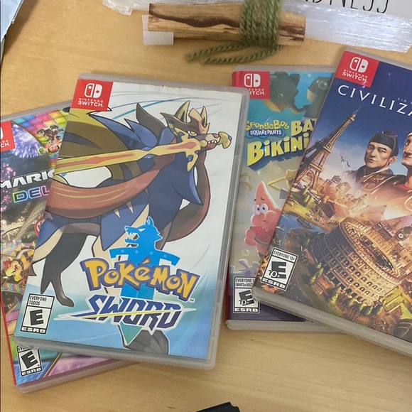 Nintendo Switch Console with Games and Accessories - Picture 2 of 2